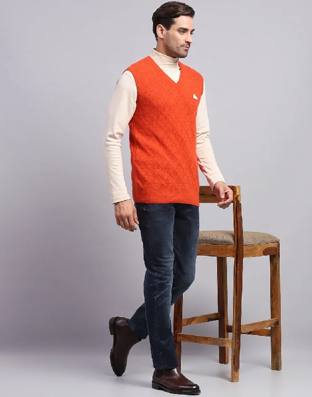 End-of-season sale – men’s clothing essentials up to 60% off!  Men Orange Self Design V Neck Sleeveless Sweater