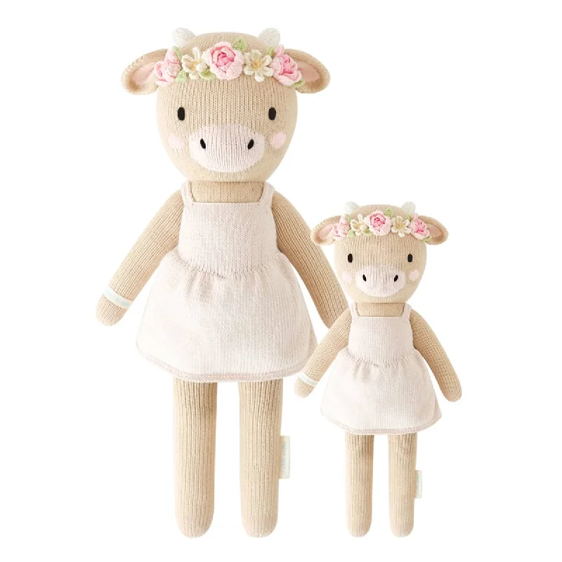 Fluffy and warm toy companionsCuddle + Kind Hand-Knit Doll - Amelia the Cow