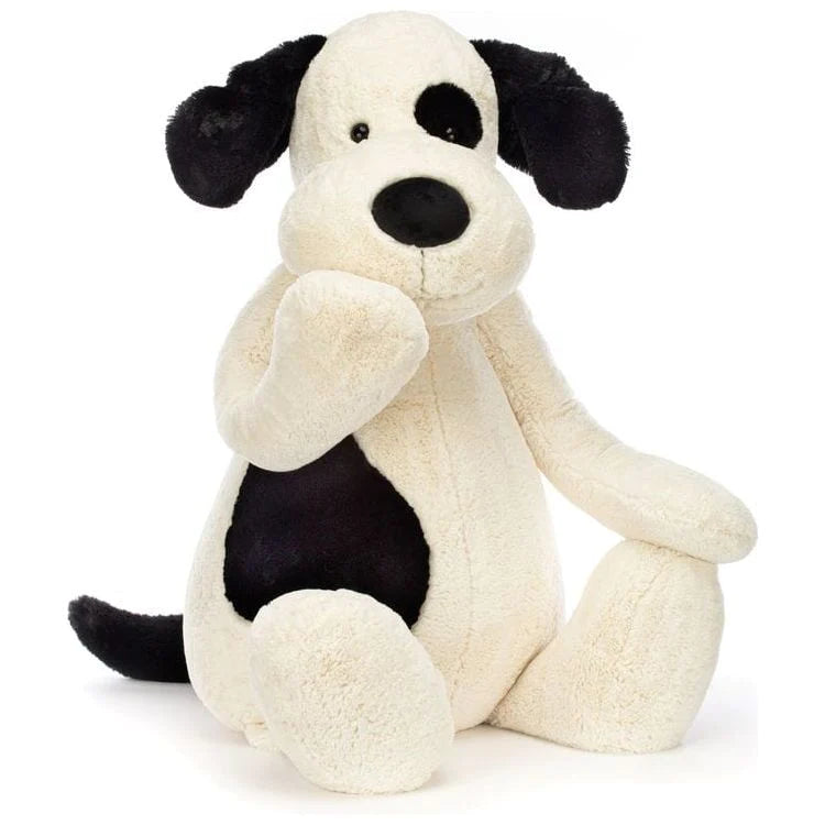 Friendly and approachable plush friendsGiant Bashful Black & Cream Puppy
