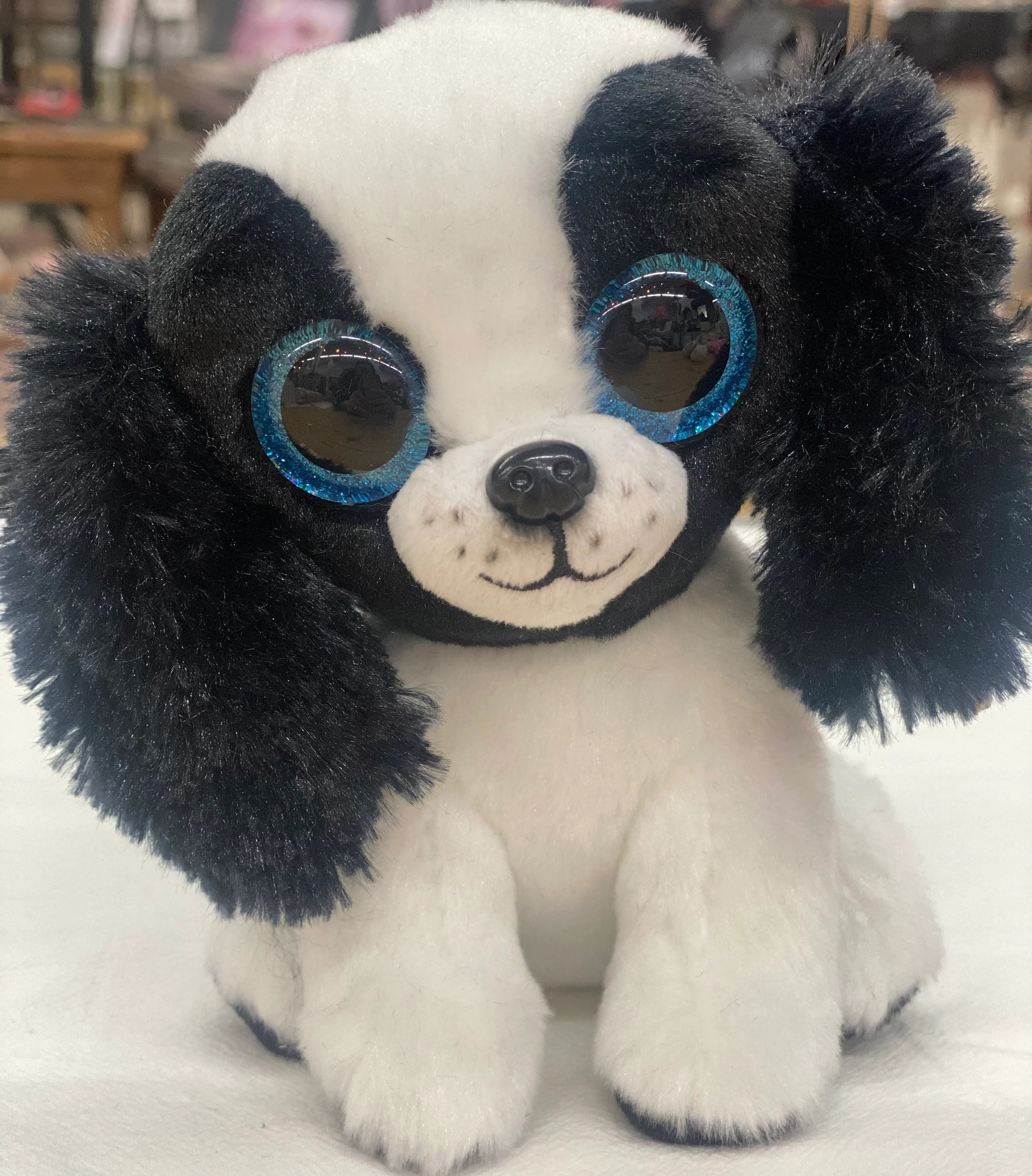 Playful and cheerful stuffed creaturesTy Beanie Boo's Sissy the Black & White Dog
