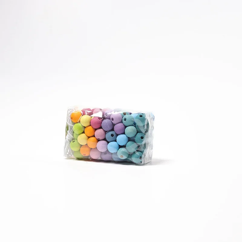 safe and non-toxic wooden toys for babies                   Grimm's 120 wooden pastel beads 12 mm