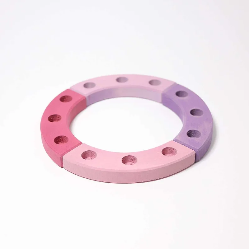 enchanting wooden toys that create lasting memories                   Grimm's wooden birthday ring 12 years - pink and purple