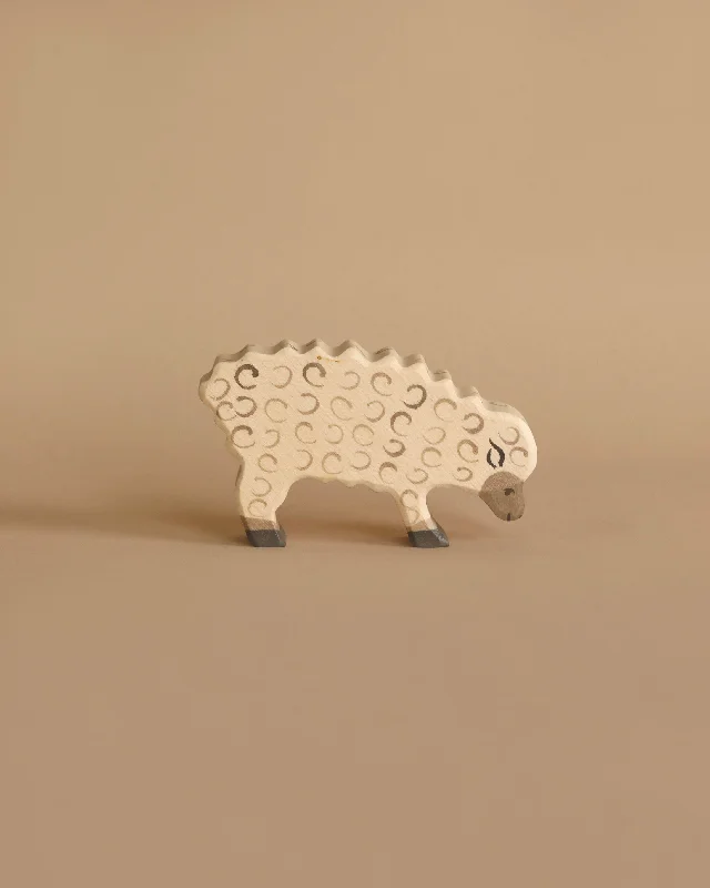 beautiful and detailed wooden toys that inspire creativity                   Holztiger Sheep, Eating