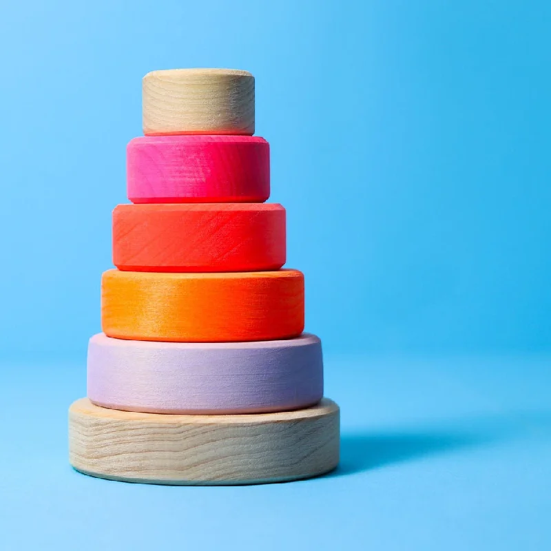 durable wooden toys                  Grimm's small conical tower neon pink