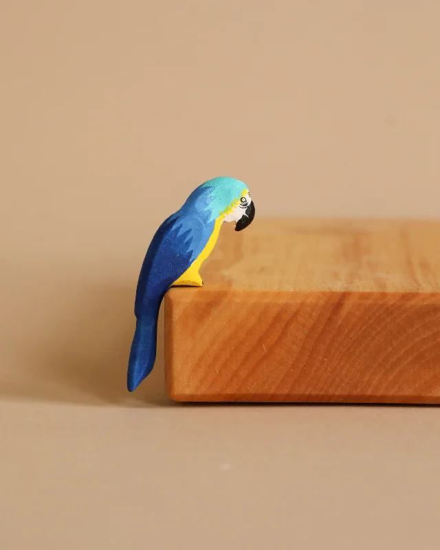 sturdy and long-lasting wooden toys for active play                   Bumbu Wooden Blue Macaw Parrot