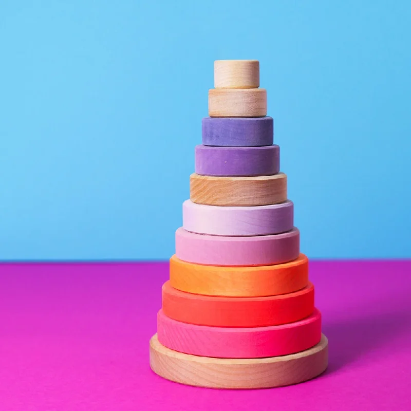 thoughtfully designed wooden toys              Grimm's conical tower neon pink