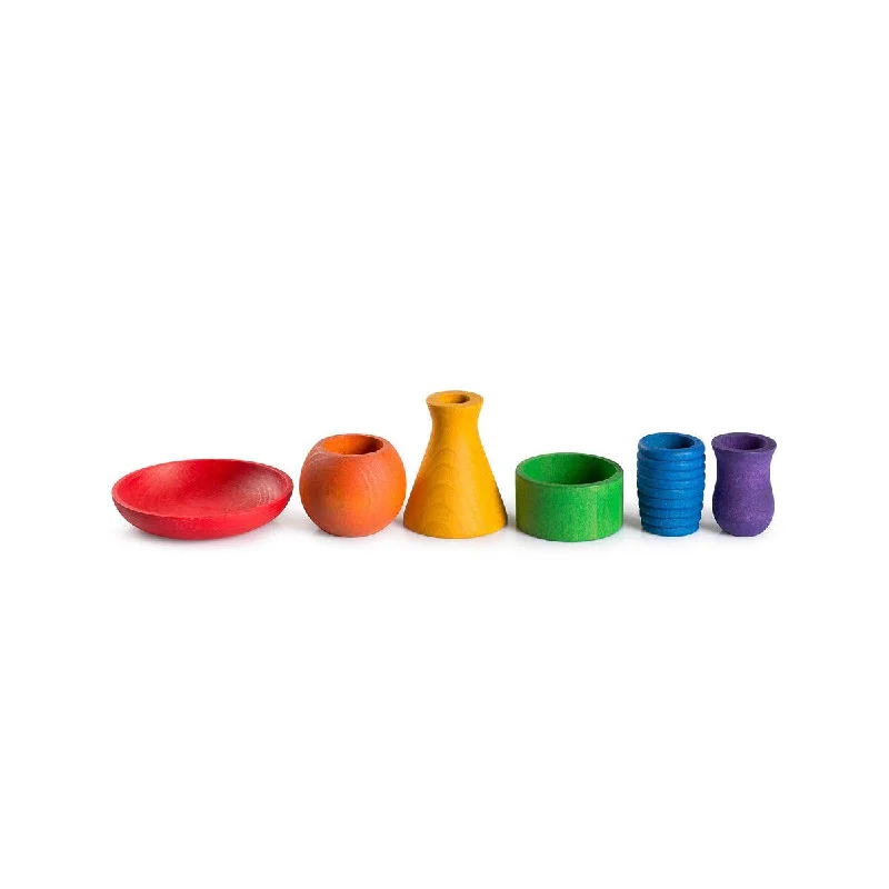 enchanting and whimsical wooden toys that captivate attention                   Grapat coloured pots